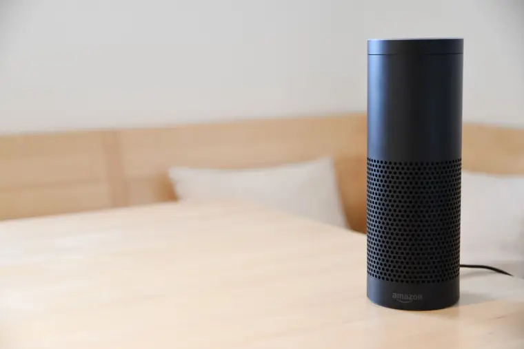 Smart speaker on a wooden table