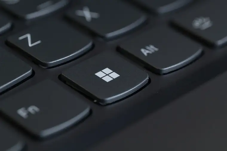 Close-up of the Windows key on a laptop keyboard